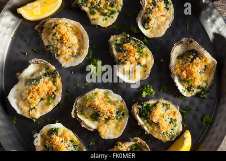 Homemade Creamy Oysters Rockefeller with Cheese and Spinach Stock Photo