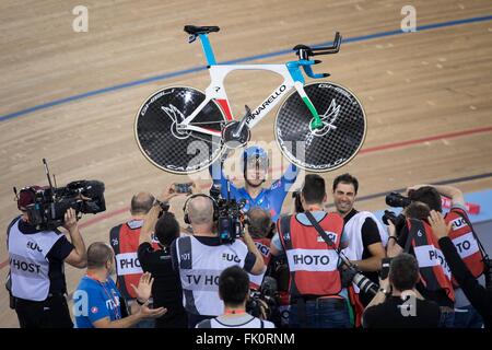 London, UK. 4th Mar, 2016. Filippo Ganna (above) of Italy celebrates after winning the gold medal in the Men's Individual Pursuit Final at the UCI 2016 Track Cycling World Championships in London, Britain on March 4, 2016. © Richard Washbrooke/Xinhua/Alamy Live News Stock Photo