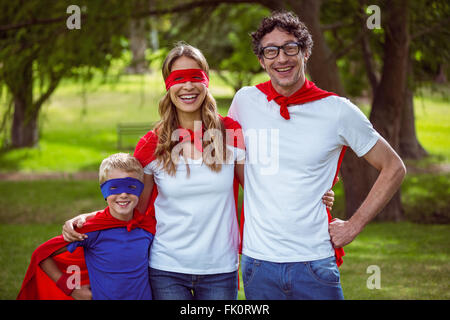 Happy family pretending to be superhero Stock Photo