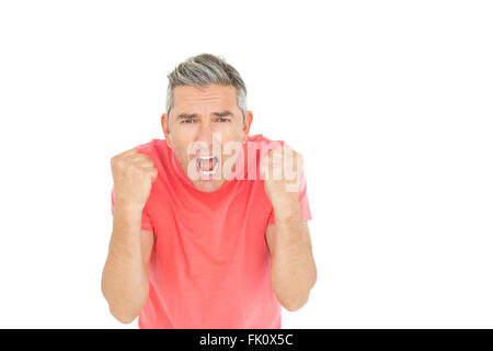 Angry man shouting in front of the camera Stock Photo