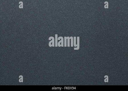 Dark grey cardboard texture. Grey background. Stock Photo