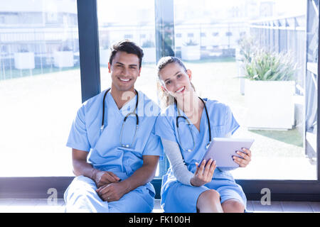 Medical team interacting using digital Stock Photo