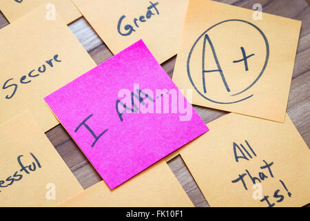 very powerful self help concept using positive messages and a I am floating above all the positive thoughts Stock Photo