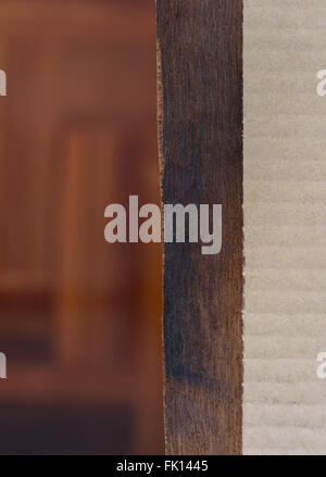 Cardboard paper with blur wooden background Stock Photo