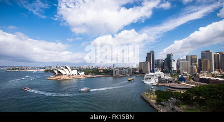 A panorama of Sydney Harbour from Sydney Harbour Bridge. P&O Cruises ship, Aurora, is berthed at the passenger terminal (right) Stock Photo