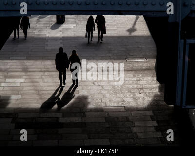 Long shadows as the sun goes down on the South Bank Stock Photo