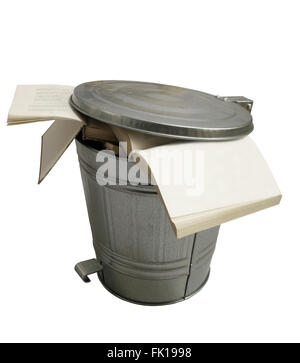 Open books thrown in a metallic trash can isolated on white background Stock Photo