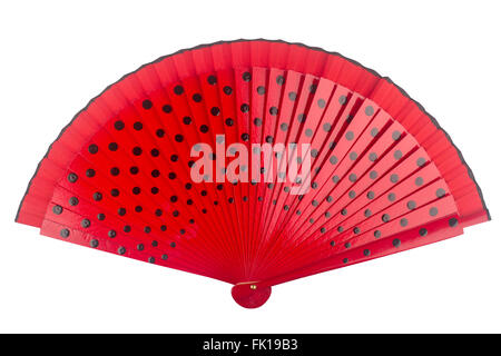 Open red fan with black dots isolated on white background Stock Photo