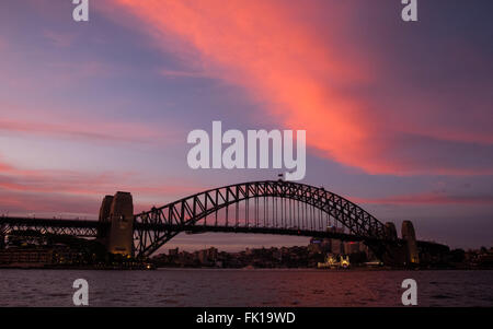 A colourful dusk over Sydney Harbour Bridge Stock Photo