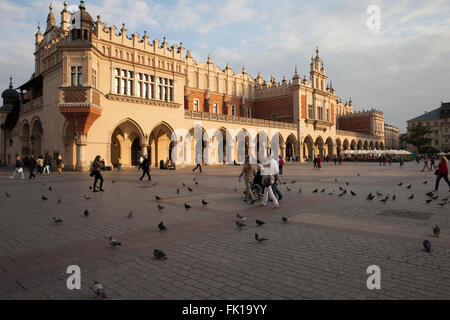 City of Krakow in Poland, Cloth Hall - Sukiennice shopping centre on the Main Market Square in the Old Town at sunset. Stock Photo