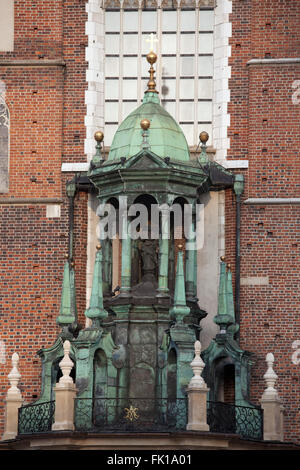 Poland, city of  Krakow (Cracow), ornate porch top of the main entrance, architectural details of St. Mary Basilica - Mariacki C Stock Photo