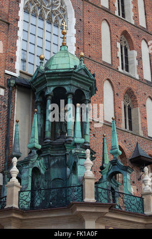 Poland, city of  Krakow (Cracow), ornate porch top of the main entrance, architectural details of St. Mary Basilica - Mariacki C Stock Photo