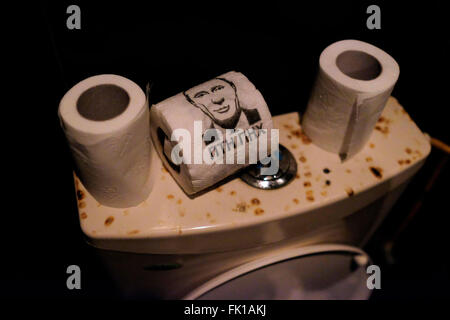 A toilet paper bearing the image of Russian President Vladimir Putin in a shabby bar in Kiev Ukraine Stock Photo