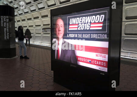 Washington, DC, USA. 04th Mar, 2016. A woman walks past an advertising panel for the new season of the US television series 'House of Cards' in a subway station in Washington, DC, USA, 04 March 2016. Photo: MAREN HENNEMUTH/dpa/Alamy Live News Stock Photo