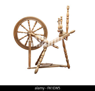 Nice ancient wooden spinning wheel on white background. Isolated with clipping path Stock Photo