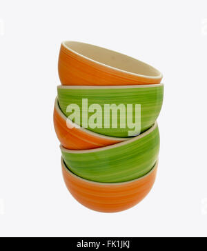 Bright ceramic bowls, green and orange to eco food Stock Photo