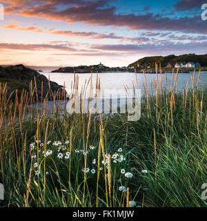 Sunset at a beach near Portnaluchaig on Loch Nan Ceall in the Sound of Arisaig near Arisaig on the road to the isles on the West Coast of Scotland Stock Photo