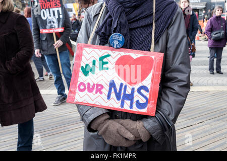 Bristol, UK, 5th March, 2016.  Protesters are pictured as they take part in a 'save our NHS' march and demonstration in Bristol.The march and rally was organised so that people could show their support of the NHS and to voice their concerns over the future of the NHS and junior doctor contracts. Credit:  lynchpics/Alamy Live News Stock Photo