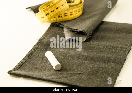 still life with a tape measure a chalk and tissue Stock Photo
