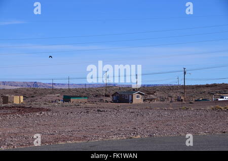 navajo reservation arizona indian housing desert shacks car scrubland poverty native american Stock Photo