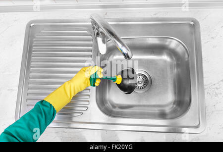 Cleaning the old sinks. Stock Photo