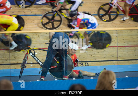 London, UK. 5th Mar, 2016. Luo Xiaoling of China crashes in the Women's Omnium Elmination Race at the UCI 2016 Track Cycling World Championships in London, Britain on March 5, 2016. Credit:  Richard Washbrooke/Xinhua/Alamy Live News Stock Photo