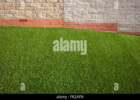 Artificial grass / astro turf on a new build housing estate. Bicester, Oxfordshire, England Stock Photo