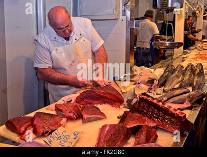 Fish monger on the Cadiz fish market, Cadiz, Spain Stock Photo