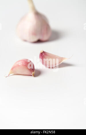 Fresh Garlic With Two Cloves On White Background Stock Photo