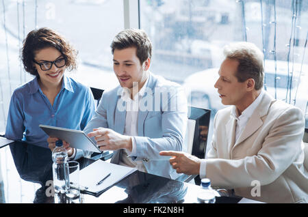 Creative team discussing project Stock Photo