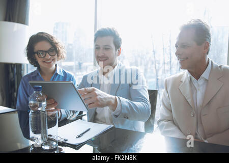 Creative team sitting at the table Stock Photo