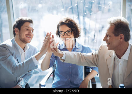 Creative team sitting at the table Stock Photo