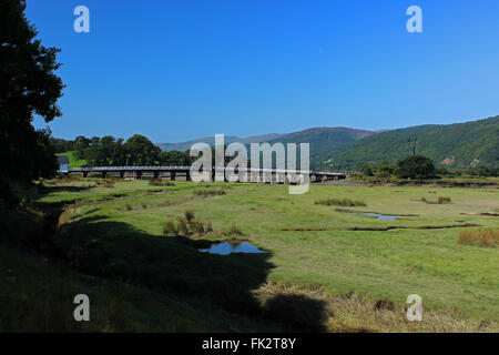 The Penmaenpool toll bridge on the Mawddach Estuary Gwynedd Wales Stock Photo