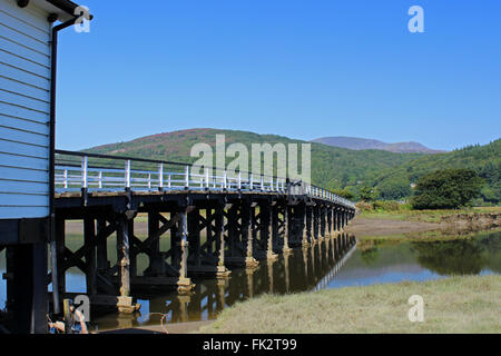 The Penmaenpool toll bridge on the Mawddach Estuary Gwynedd Wales Stock Photo