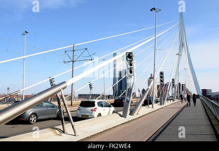 Cyclists crossing the Iconic Erasmus bridge (Erasmusbrug), Rotterdam ...