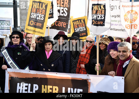 Stars join activists to 'Walk in her shoes' at mothers day march for solidarity with women and girls around the world at charity CARE internationals rally in London, UK. 06th Mar, 2016. Credit:  Alan West/Alamy Live News Stock Photo