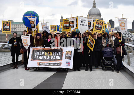 Stars join activists to 'Walk in her shoes' at mothers day march for solidarity with women and girls around the world at charity CARE internationals rally in London, UK. 06th Mar, 2016. Credit:  Alan West/Alamy Live News Stock Photo