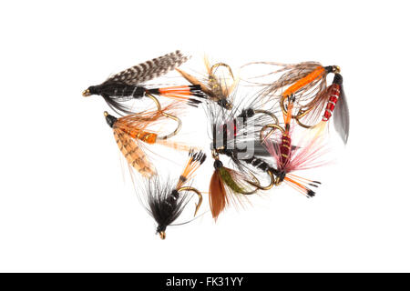 Handmade flies used by fishermen to attract trout and salmon by game fishermen. Stock Photo