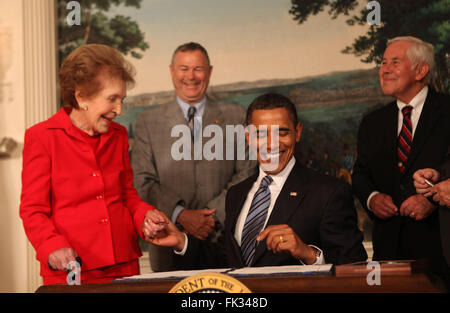 Washington, District of Columbia, USA. 2nd June, 2008. Washington, DC - June 2, 2009 -- United States President Barack Obama gives former first lady Nancy Reagan a ceremonial pen at the signing of the Ronald Reagan Centennial Commission Act in the Diplomatic Reception Room of the White House on Tuesday, June 2, 2009 . In the background at left is U.S. Representative Dana Rohrabacher (Republican of California) and U.S. Senator Richard Lugar (Republican of Indiana). Credit: Dennis Brack/Pool via CNP © Dennis Brack/CNP/ZUMA Wire/Alamy Live News Stock Photo