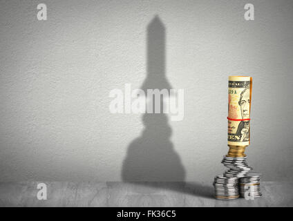 financial growth concept, money with rocket shadow Stock Photo