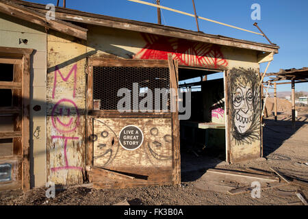 Graffiti on an abandoned building in Bombay Beach on the Salton Sea California Stock Photo