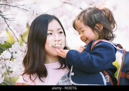 Japanese mom and daughter enjoying the cherry blossoms Stock Photo - Alamy