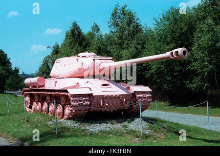 Famous Pink Tank IS-2 painted pink by Czech visual artist David Cerny displayed in the Military Technical Museum in Lesany, Czech Republic. Soviet heavy tank IS-2 formerly known as No 23 used to be the Monument to Soviet Tank Crews in Prague, Czechoslovakia. It was controversially painted pink by art student David Cerny and friends in 1991 and later moved to the museum. The model IS-2 was named after Soviet dictator Joseph Stalin. Stock Photo