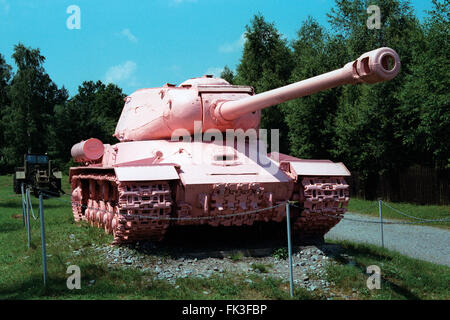 Famous Pink Tank IS-2 painted pink by Czech visual artist David Cerny displayed in the Military Technical Museum in Lesany, Czech Republic. Soviet heavy tank IS-2 formerly known as No 23 used to be the Monument to Soviet Tank Crews in Prague, Czechoslovakia. It was controversially painted pink by art student David Cerny and friends in 1991 and later moved to the museum. The model IS-2 was named after Soviet dictator Joseph Stalin. Stock Photo