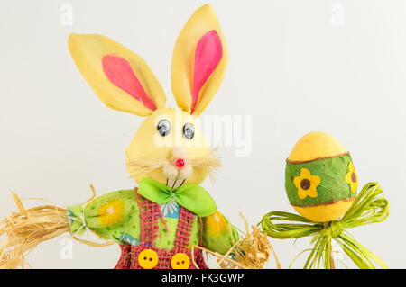 Easter bunny toy and decorated Easter eggs Stock Photo