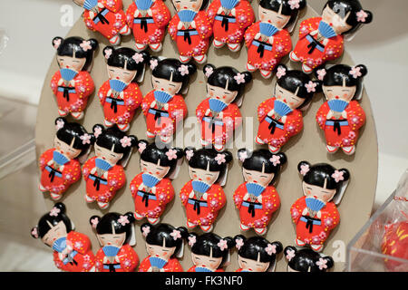 Japanese Cherry Blossom celebration doll refrigerator magnets on display at gift store - USA Stock Photo