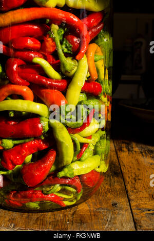 Traditional Jarred yellow, green, red, hot peppers. High resolution ...