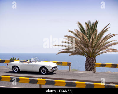 1974 MGB roadster on a road in Madeira Stock Photo