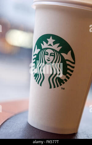 Cup of Starbucks coffee on a table Stock Photo