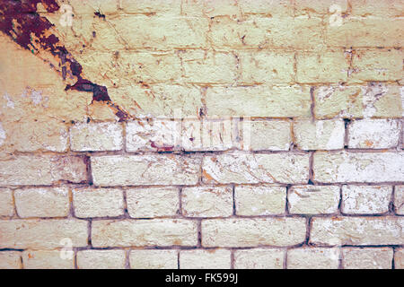 Weathered grey brick wall painted in two color for background or texture Stock Photo